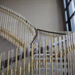 AIRY SPIRAL STAIRCASE WITH BRASS AND GLASS BANISTER